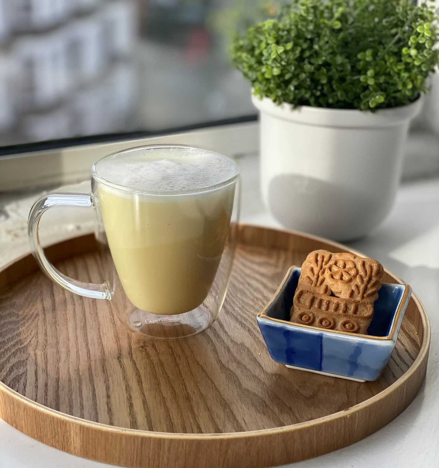 A cup of a buckwheat tea latte, made using buckwheat tea by T. and almond milk